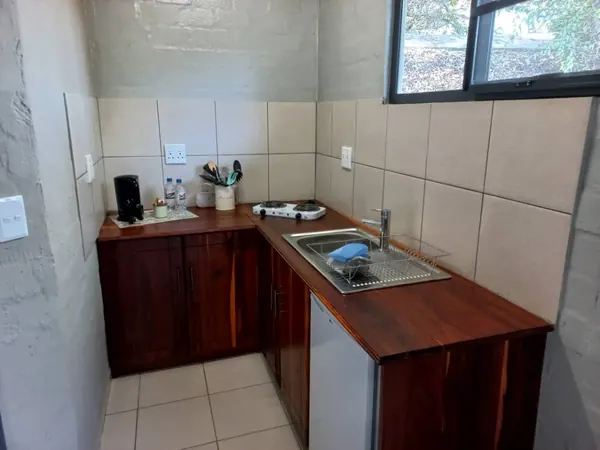Chalet kitchenette with wooden cabinets